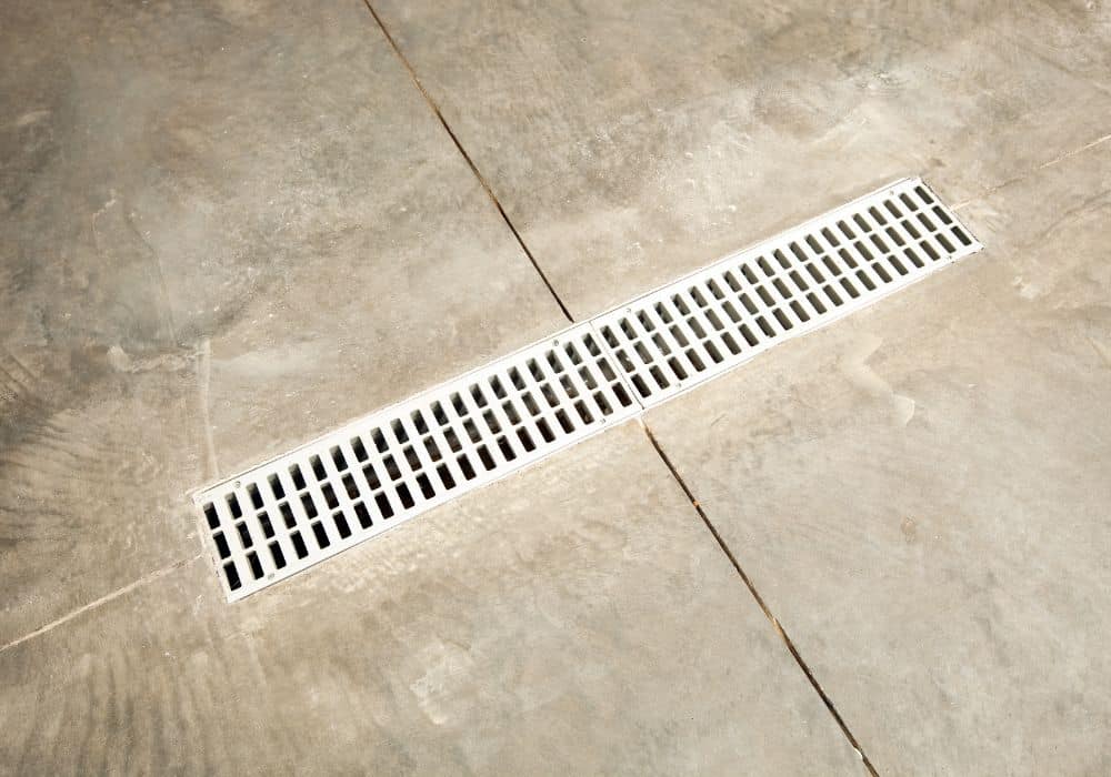 What is the importance of a garage drain?